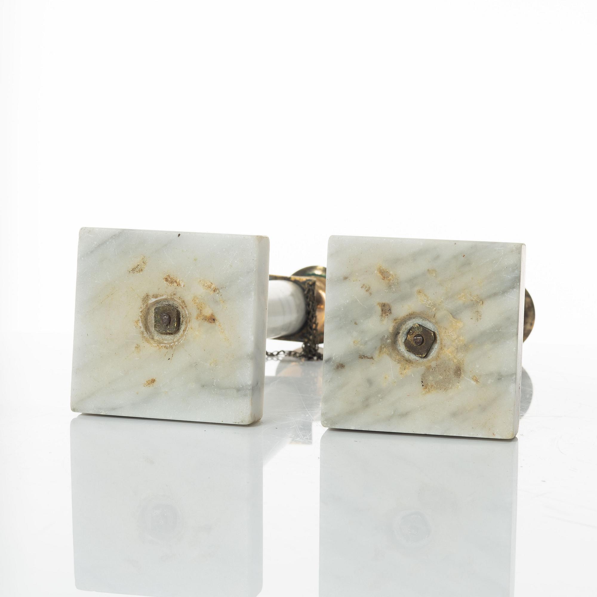 A pair of gilt-brass and marble late Gustavians candlesticks, late 18th century.