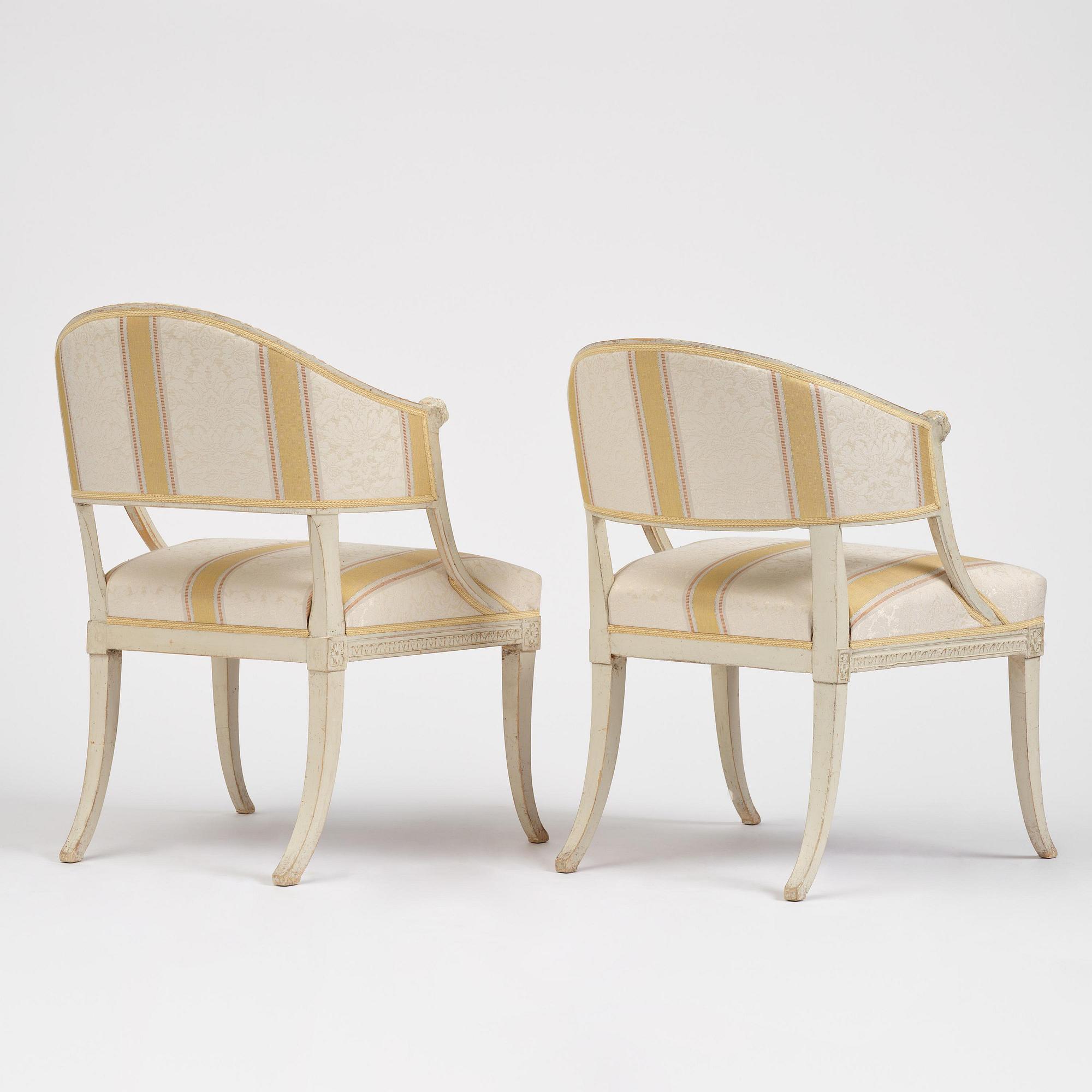 A matched pair of late Gustavian armchairs.