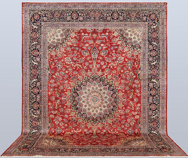 A Kashmar carpet, approx. 387 x 297 cm.