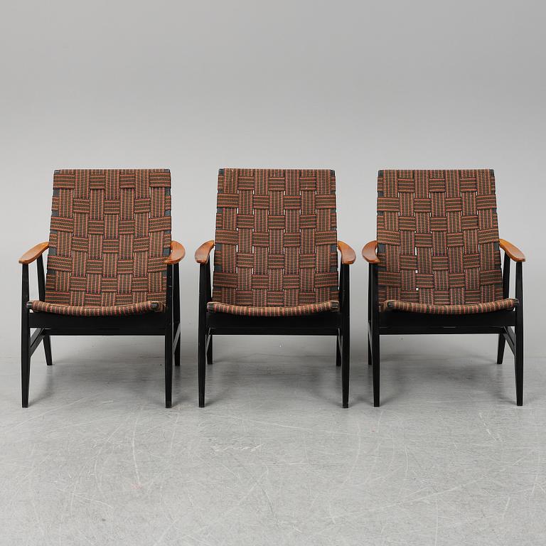 A set of three 1950's easy chairs.