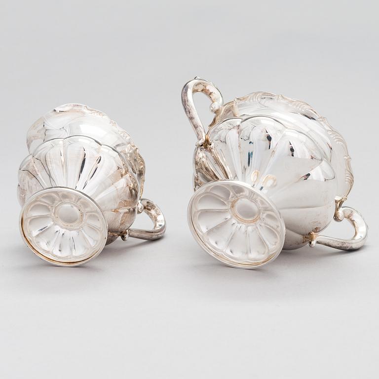 A silver coffee pot, a parcel-gilt sugar bowl and cream jug, Turku Finland 1946 and 1985.