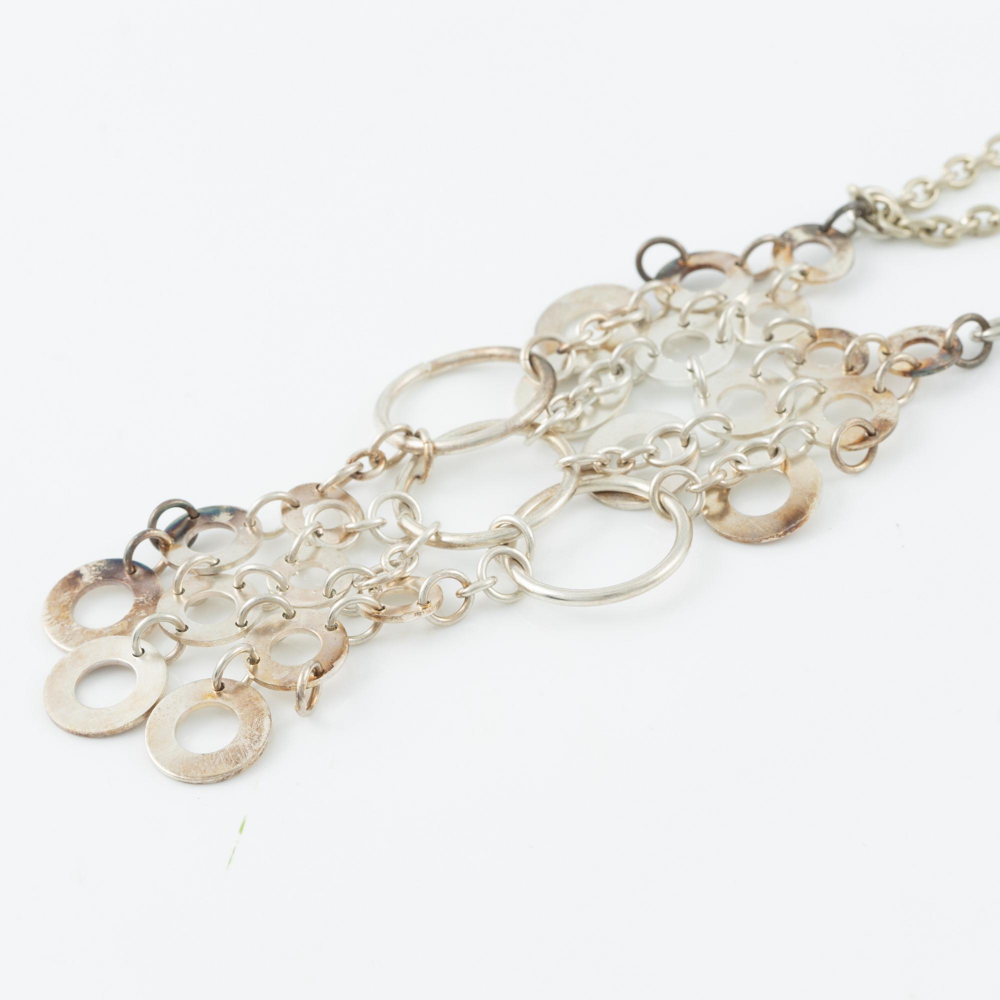 Siv Lagerström, two necklaces white metal.