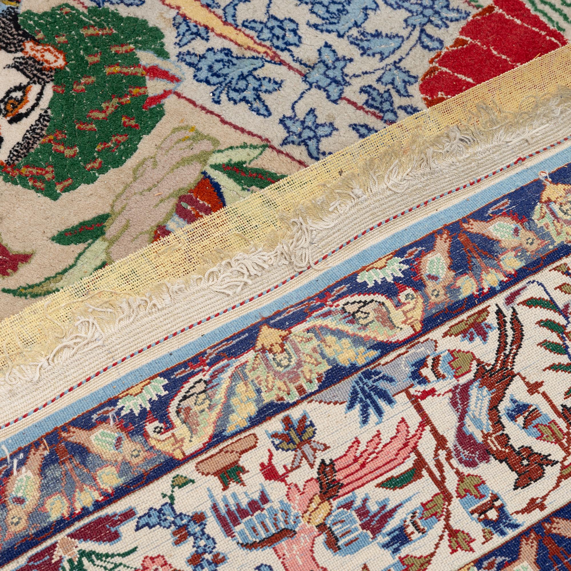 A Tabriz rug, figural, c. 152 x 108 cm.