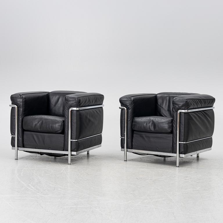 Le Corbusier (Charles-Édouard Jeanneret), Pierre Jeanneret, Charlotte Perriand & Le Corbusier, a pair of 'LC2' armchairs, Cassina.