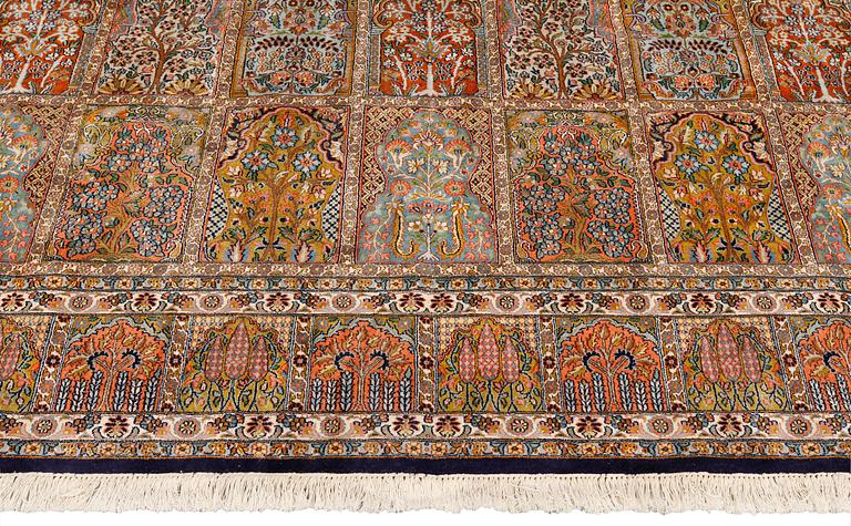 A carpet silk Kashmir, c 330 x 245 cm.