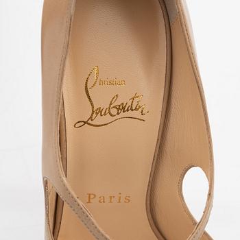 Christian Louboutin, a pair of beige leather sandals, size 37.