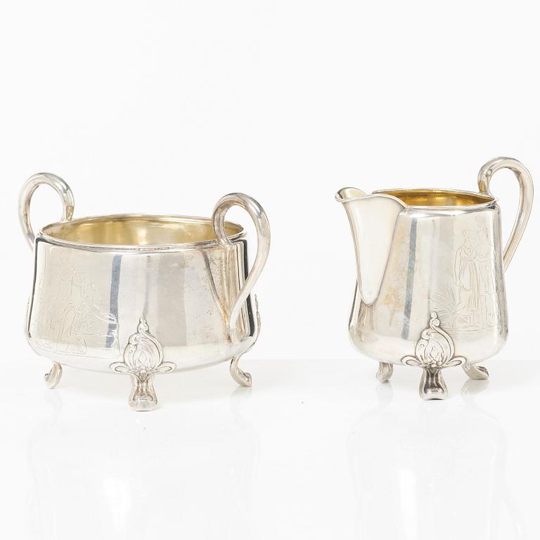 A Danish silver sugar bowl and cream jug.
