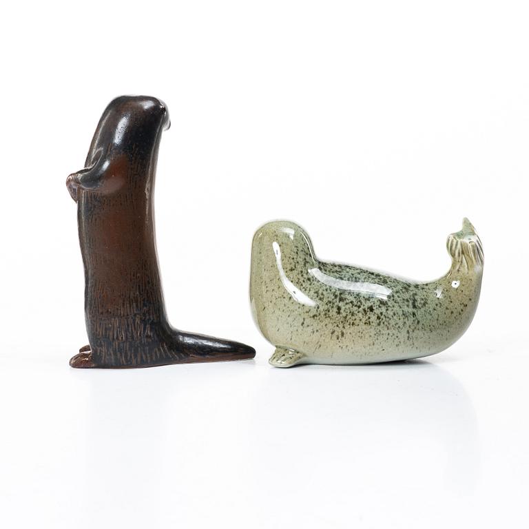 Lisa Larson, a 'Pilgrimsfalk' and 'Bison' figurine, Gustavsberg for NK, Nordiska Kompaniet in collaboration with WWF.
