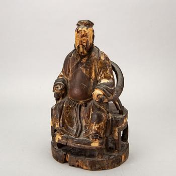 A Chinese late Qing painted wooden sculpture.