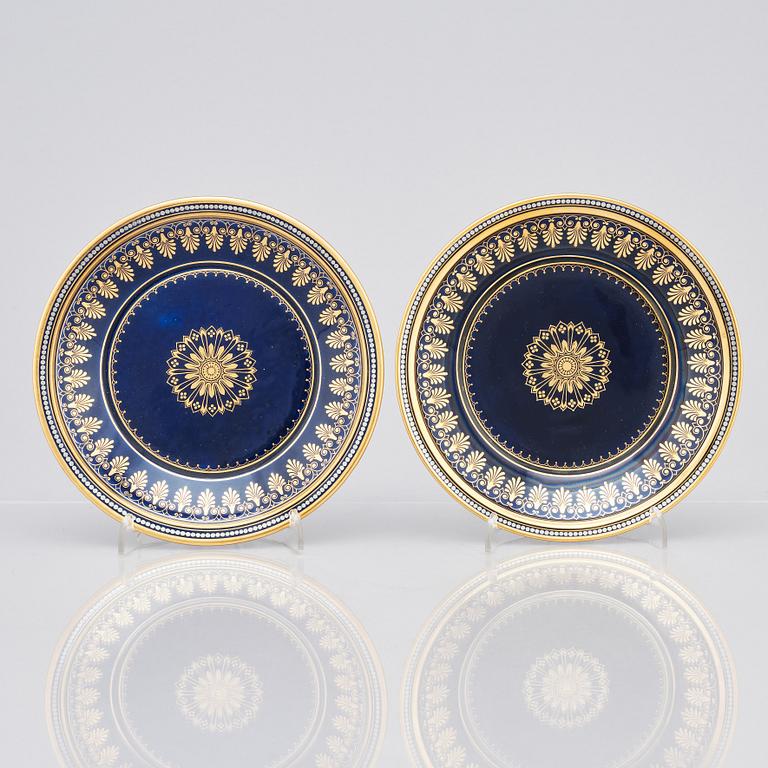 A pair of Sèvres cups with stands, 19th Century.