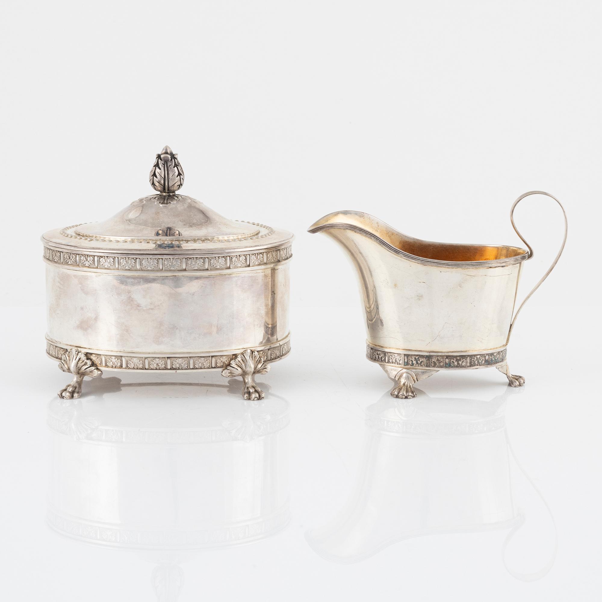 Jacob Engelberth Torsk, a Gustavian style silver creamer and sugar caddy, Stockholm, 1899.
