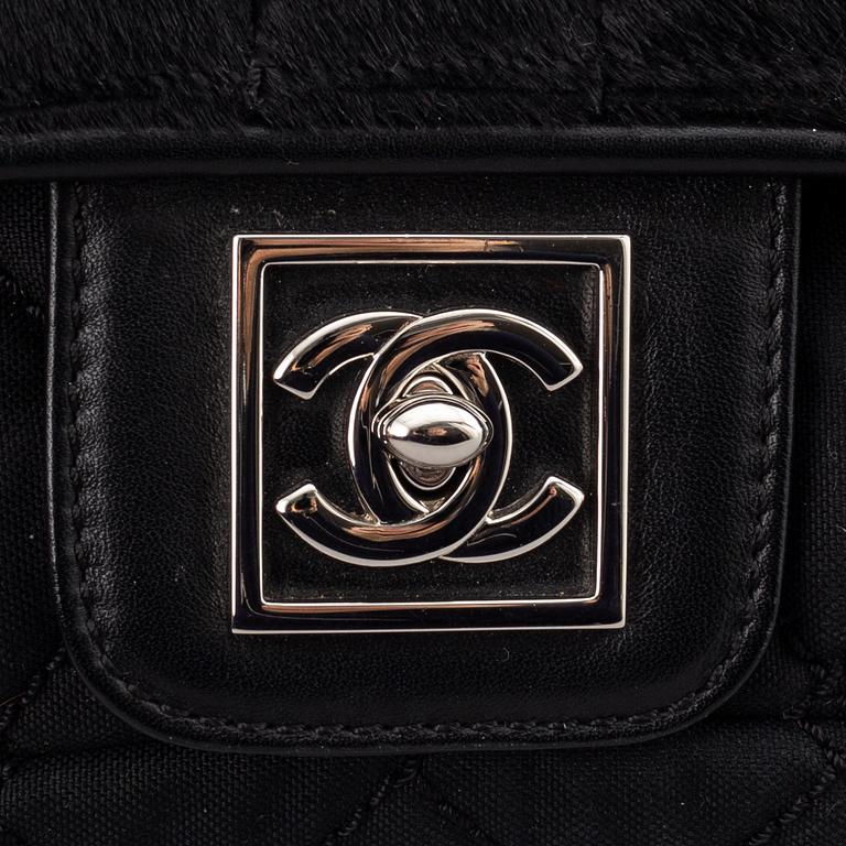 Chanel, a canvas and pony hair handbag, 2005-06.