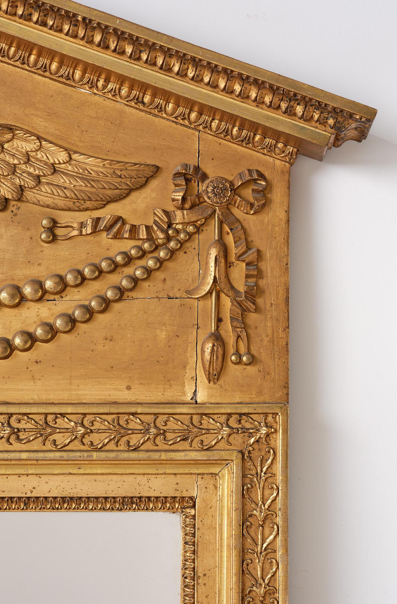 A late Gustavian giltwood mirror, Stockolm circa 1800.