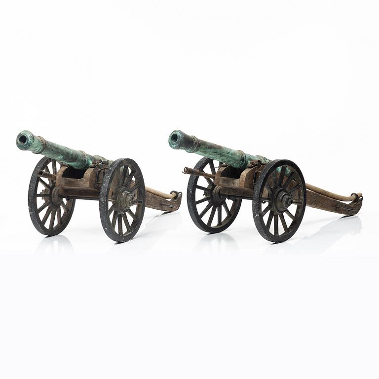 Modellkanoner ett par, 1900-tal.