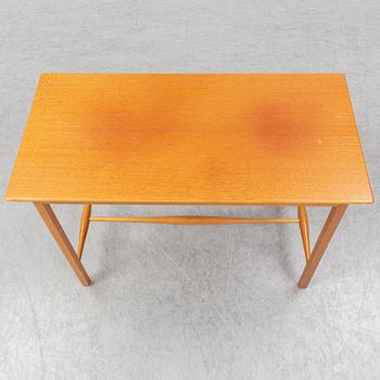 A model 1106 mahogany side table by Josef Frank for Firma Svenskt Tenn.