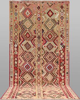 A Nomad Kilim rug, approx. 387 x 185 cm.