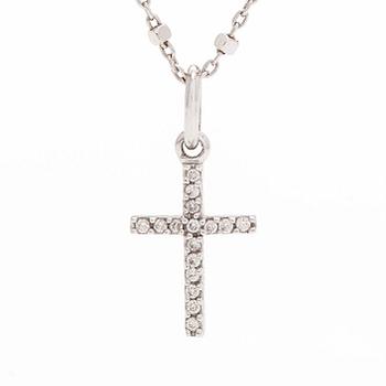 TOUS, an 18K white gold necklace with a cross pendant set with small brilliant-cut diamonds, Spain.