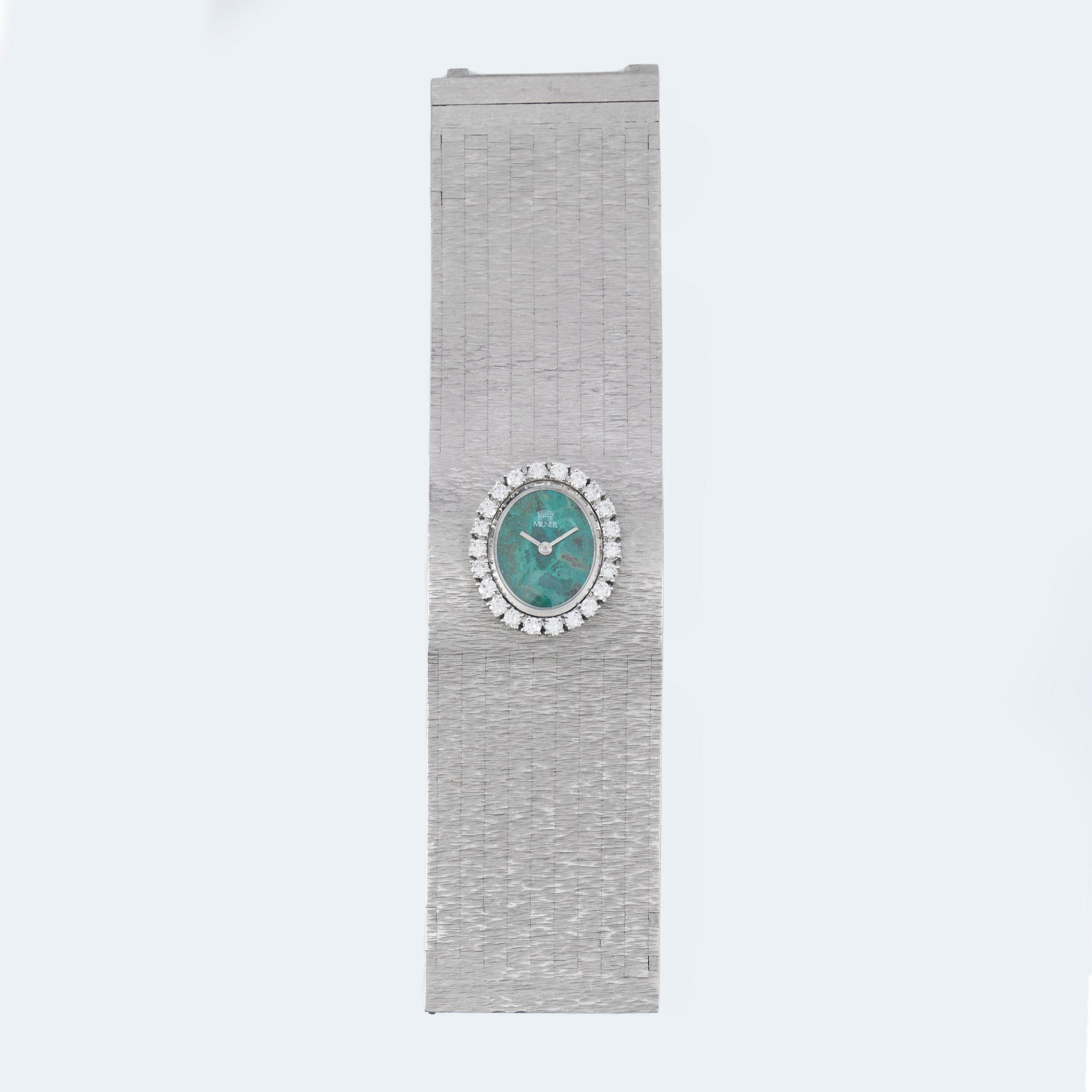 DAMUR, Milner. Urtavla i chrysocholla med diamantkrans. totalt ca 2.20 ct. Manuell.