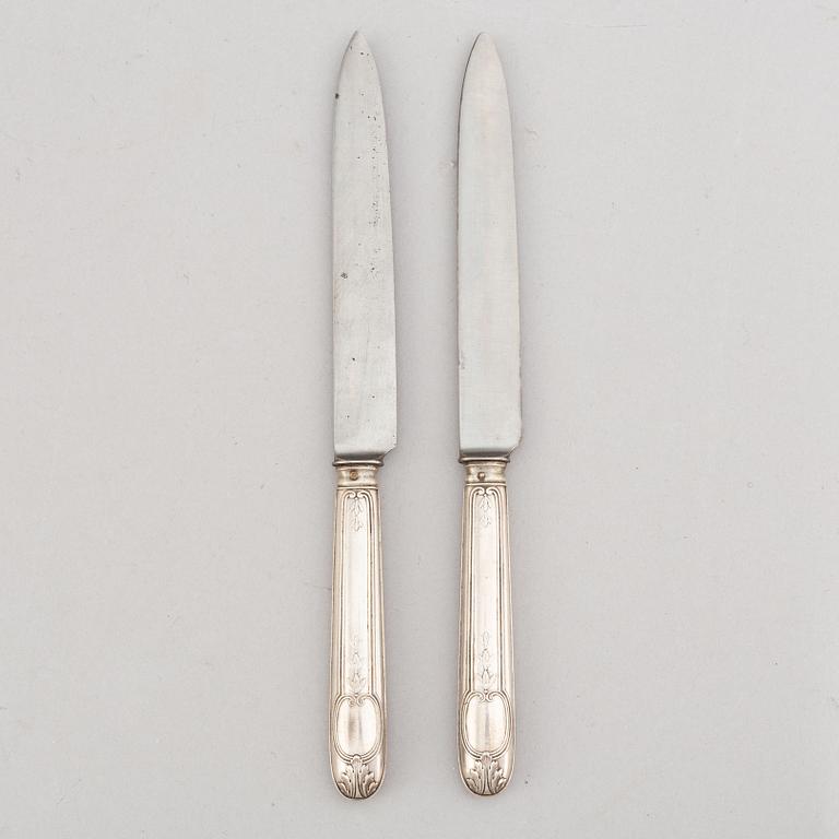 A set of twelve French silver knives, 19th century.