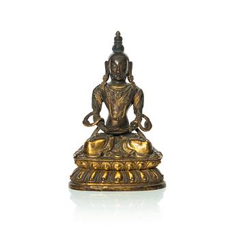 1098. A gilt copper figure of Amitayus, Tibeto-Chinese, 18th Century.