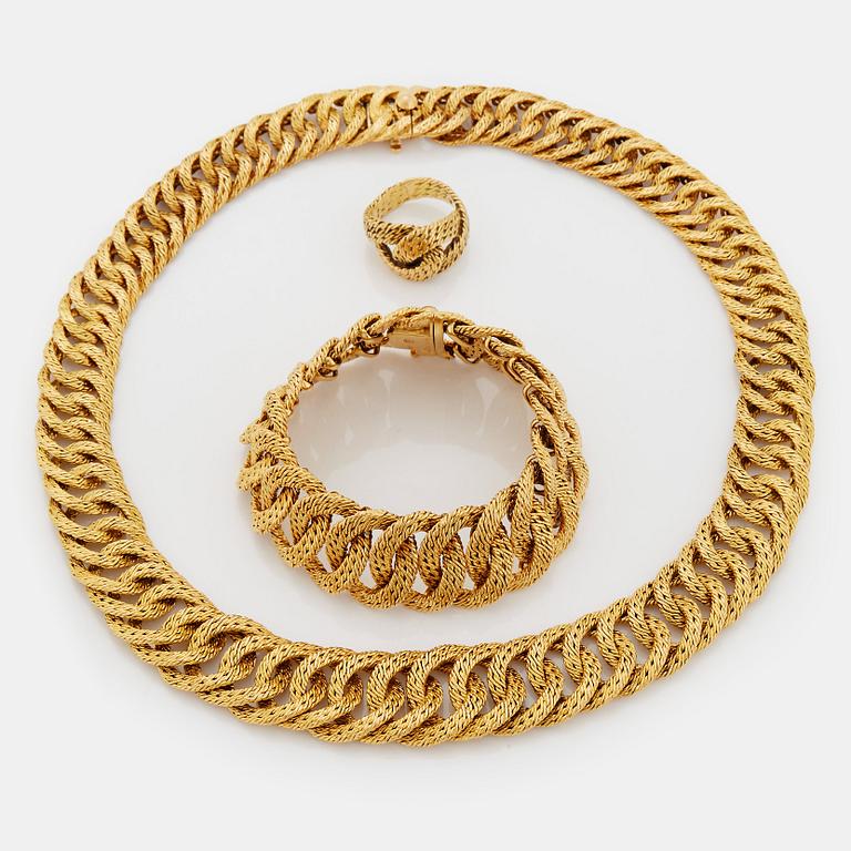 Georges L'Enfant an 18K gold demi parure comprising a necklace, a bracelet and a ring.