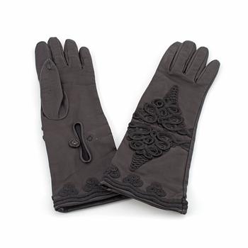 PRADA, a pair of ladies embellished black leather gloves.