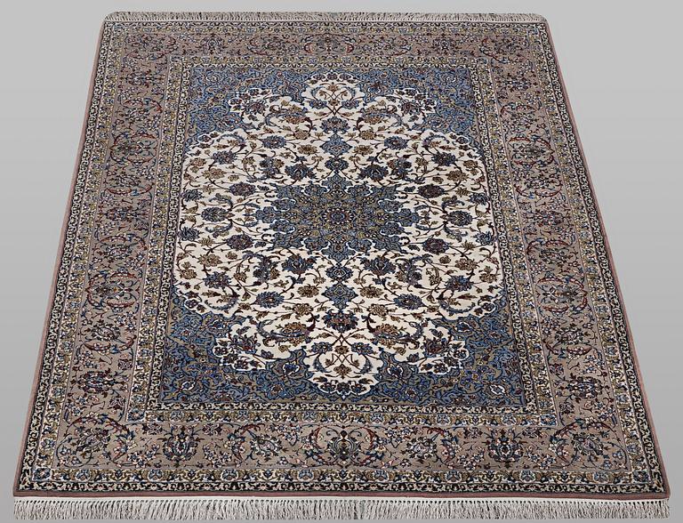 A rug, Esfahan, part silk, ca 245 x 155 cm.