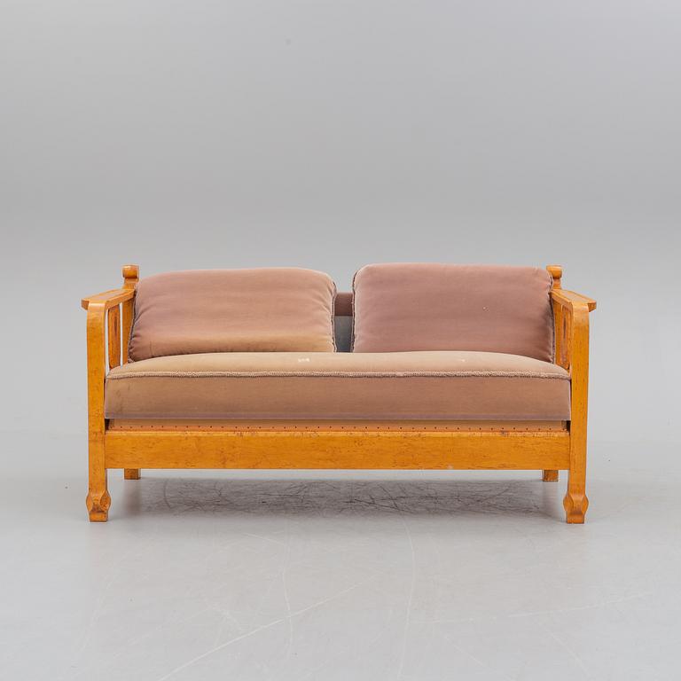 a sofa by NK Stockholm in the 1930's.