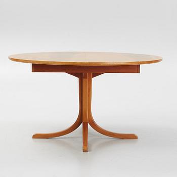 Josef Frank, a mahogany veneered model 771 dining table, Svenskt Tenn, post 1985.