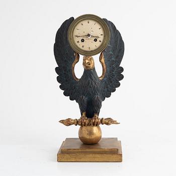 A Swedish Empire giltwood mantel clock by E. Engelbrechten (watchmaker active in Stockholm 1815-45).