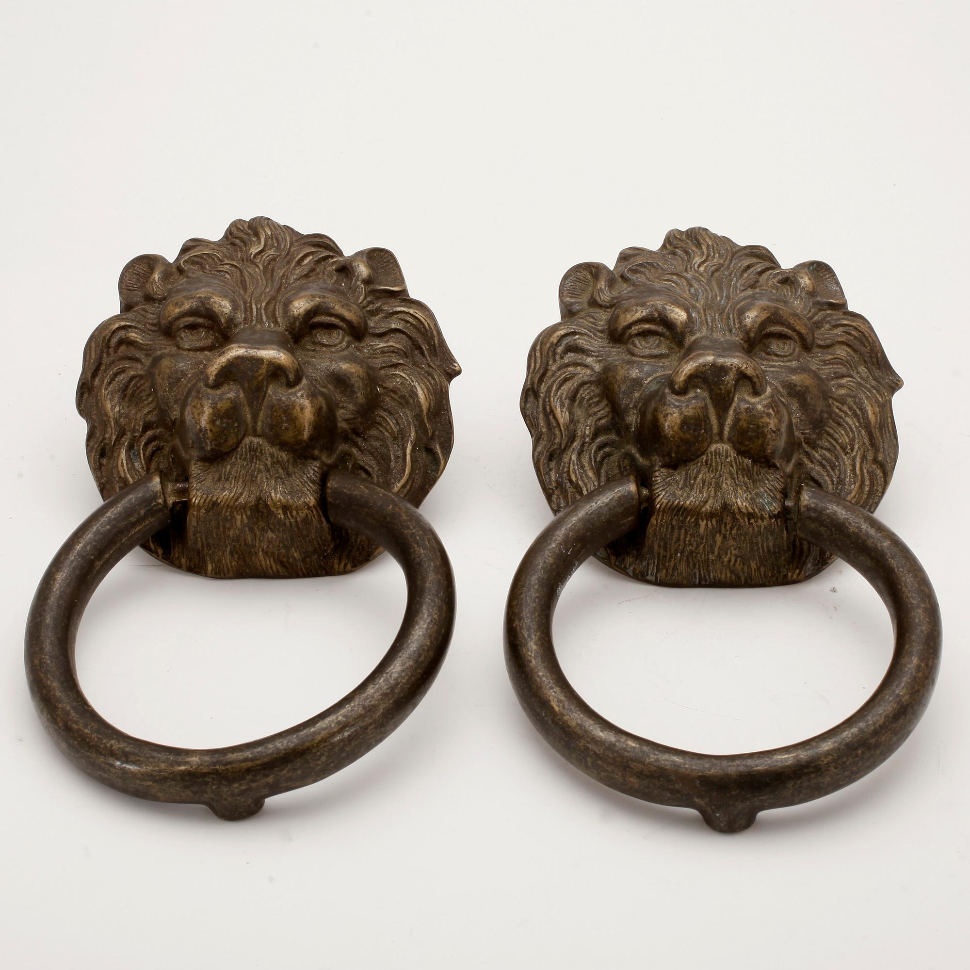 DÖRRKLAPPAR, ett par, brons, 1900-tal.