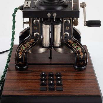 A telephone, commemorative model, after 'Taxen', LM Ericsson, late 1900s.