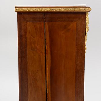 A Louis XVI-style chest of drawers, circa 1900.