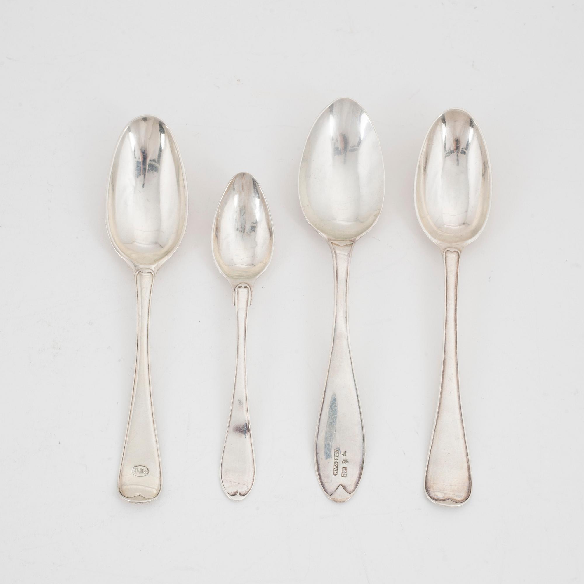 Twelve Swedish silver dessert spoons and 16 teaspoons, 19th century.