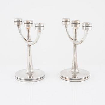 Eric Löfman, kandelabrar, ett par silver, MGAB, Uppsala, 1978-79.