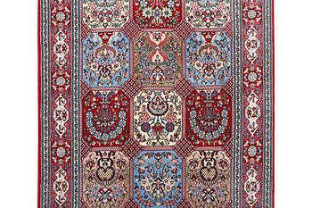 An oriental carpet, c. 250 x 150 cm.