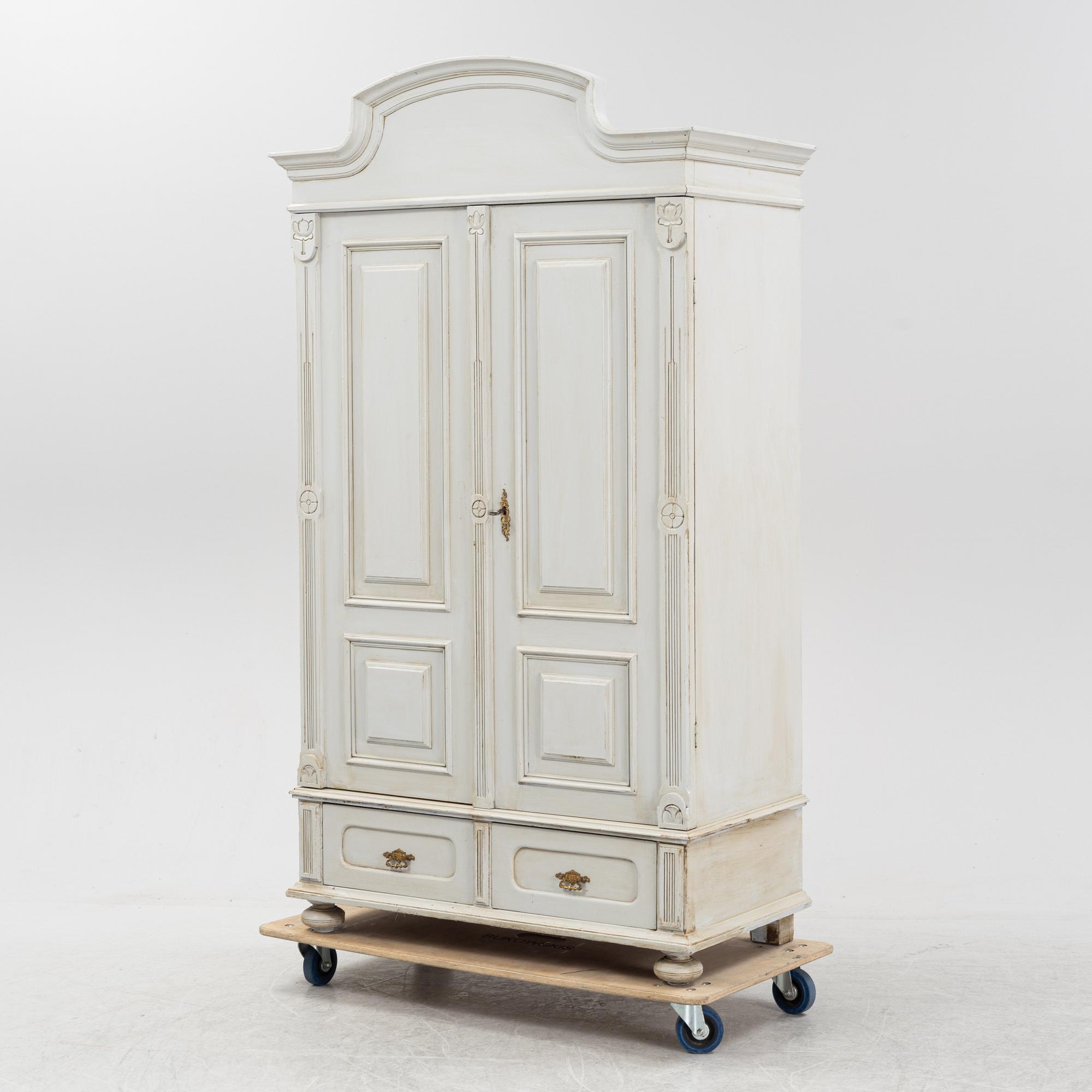 An Art Nouveau clothes cabinet, around 1900.