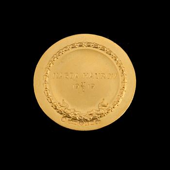 A 23 k gold medal "PALMAM
QUI MERUIT FERAT". Weight ca 21 grams.