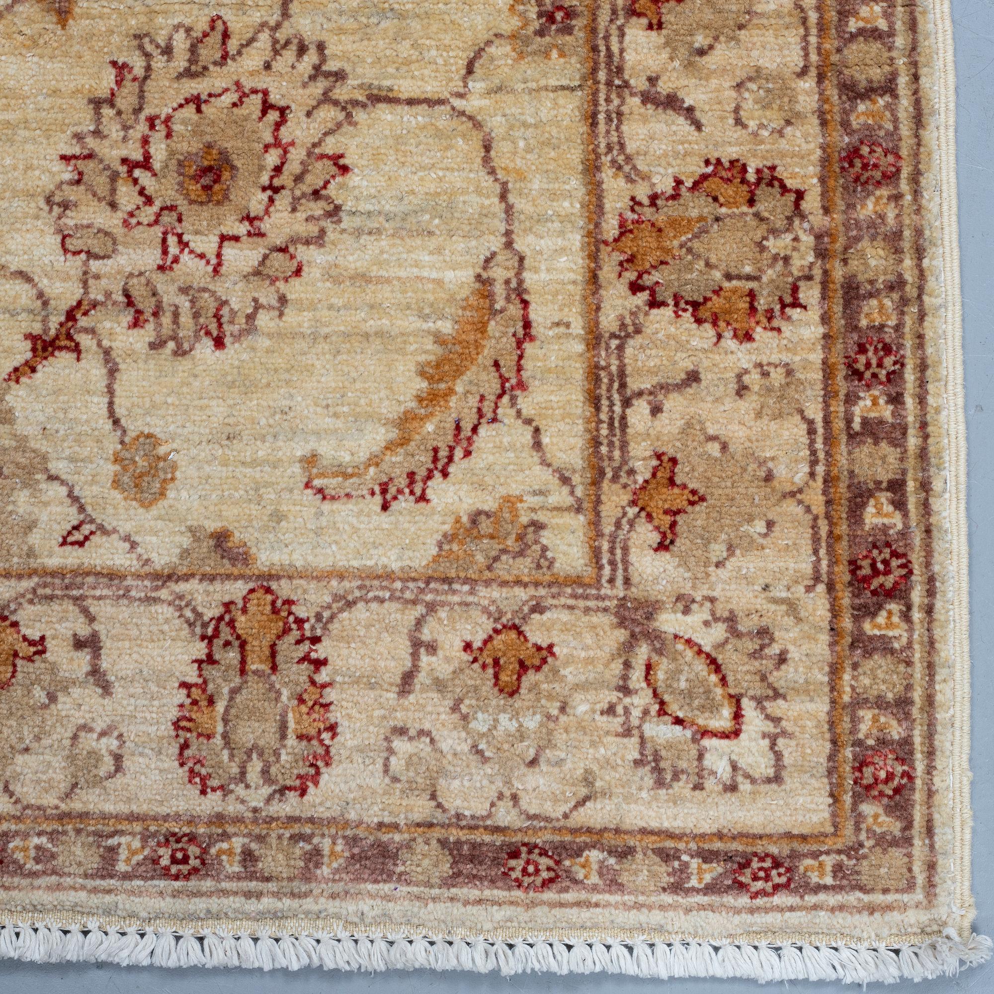 Two Zeigler design rugs, ca 84 x 61 cm.