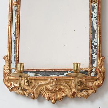 A Swedish Rococo two-light girandole mirror, 1700's.