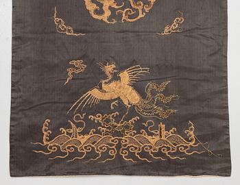 A Chinese emboridered silk chair cover, Qing dynasty, 19th century.