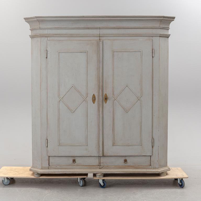 A mid 19th century painted wardrobe.