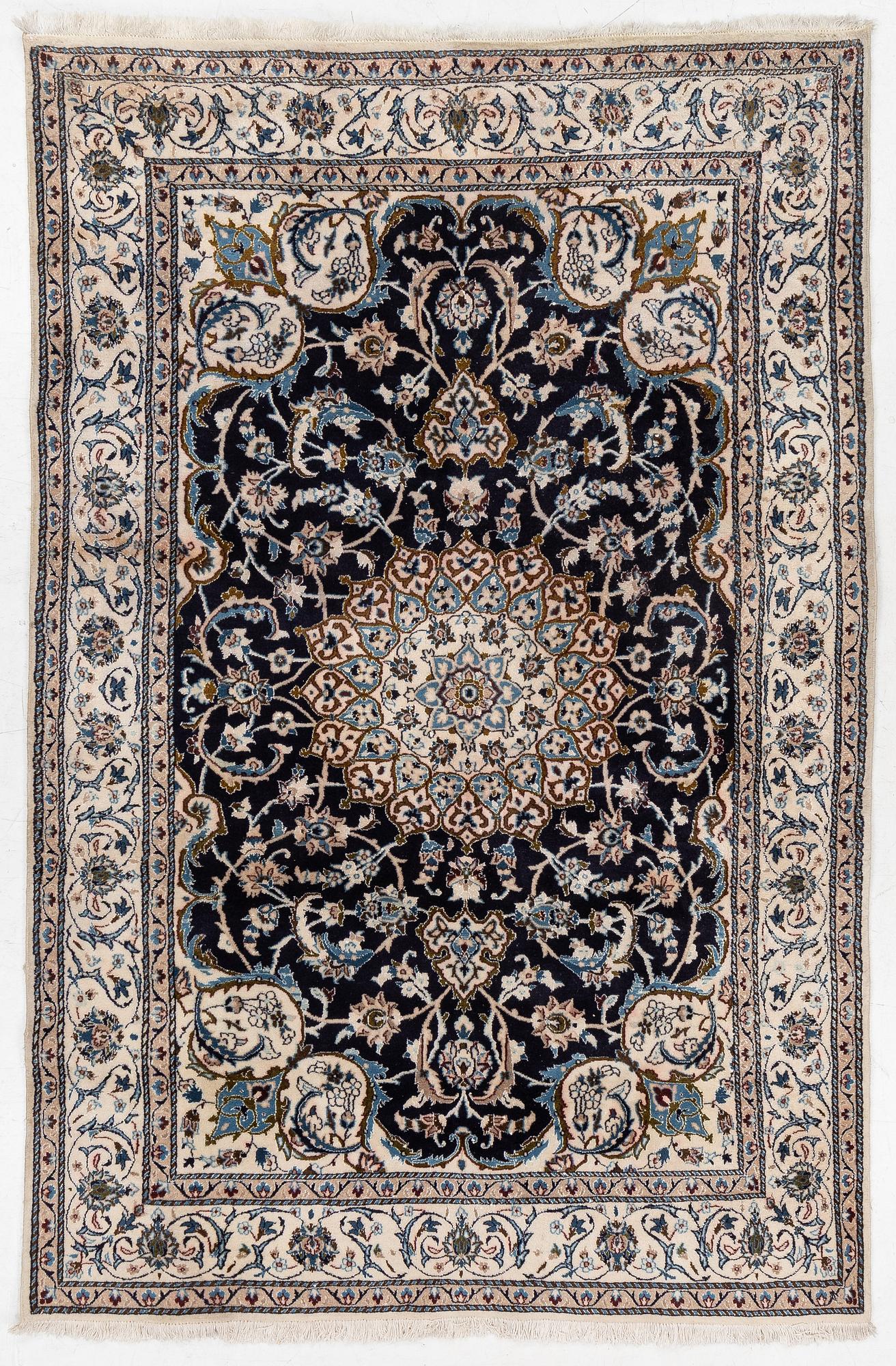 A Nain carpet, Central Persia, c. 300 x 195 cm.