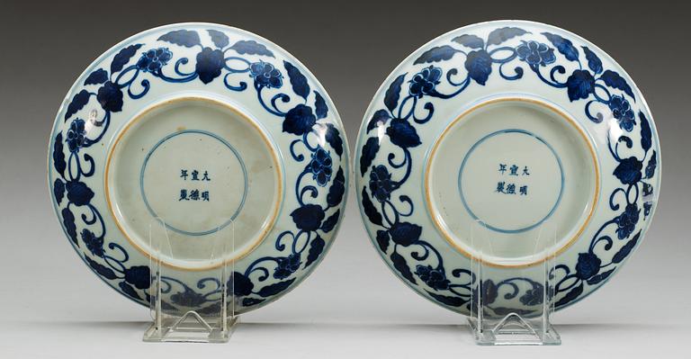 A pair of blue and white dishes, Qing dynasty (1644-1912) with Xuande six character mark.