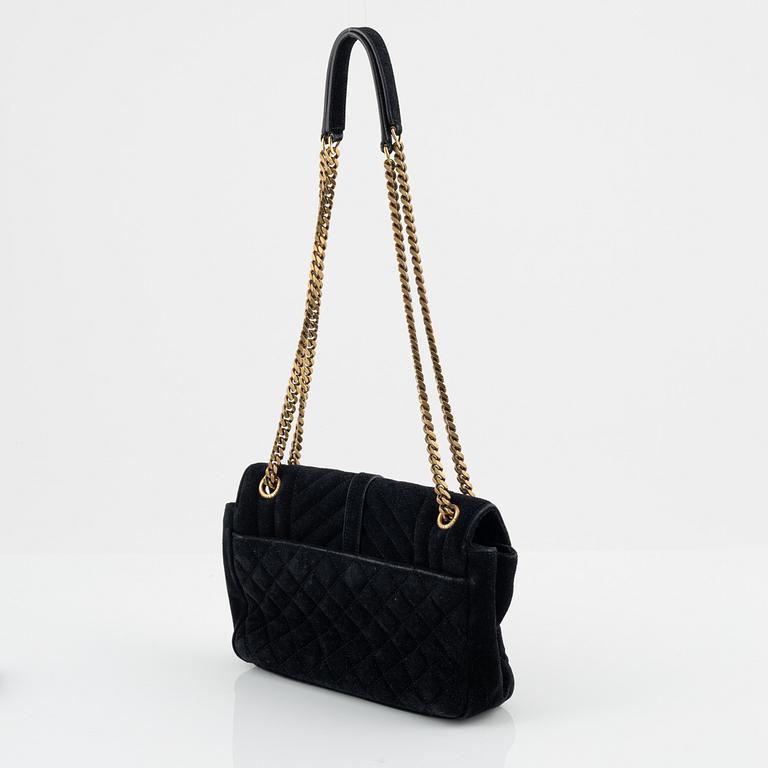 Yves Saint Laurent, a black suede 'Soft envelope bag'.