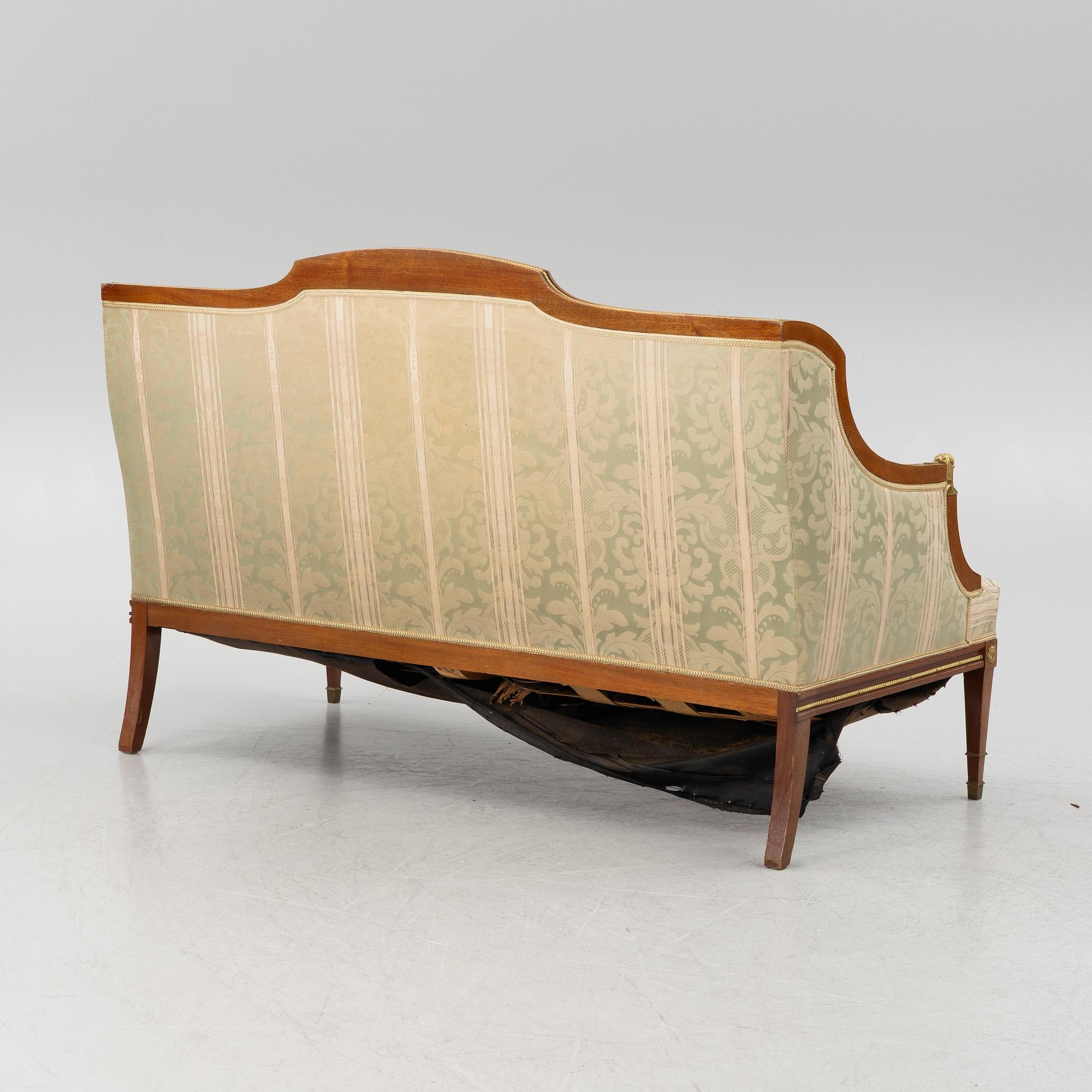 A sofa, two armchairs, four chairs and table, Empire style, 20th century.