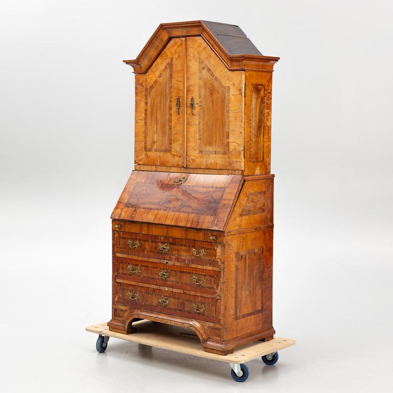 A Swedish late Baroque walnut marquetry writing cabinet.