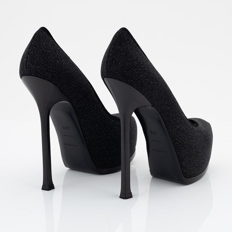 Yves Saint Laurent, a pair of black leather platform pumps, size 36 1/2.