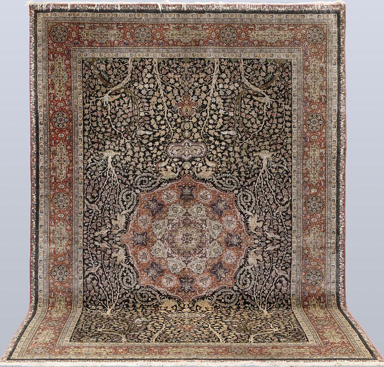A oriental figural silk carpet, 303 x 201 cm.