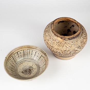 A brown glazed jar and bowl, Sawankhalok, Thailand, 14th/17th Century.